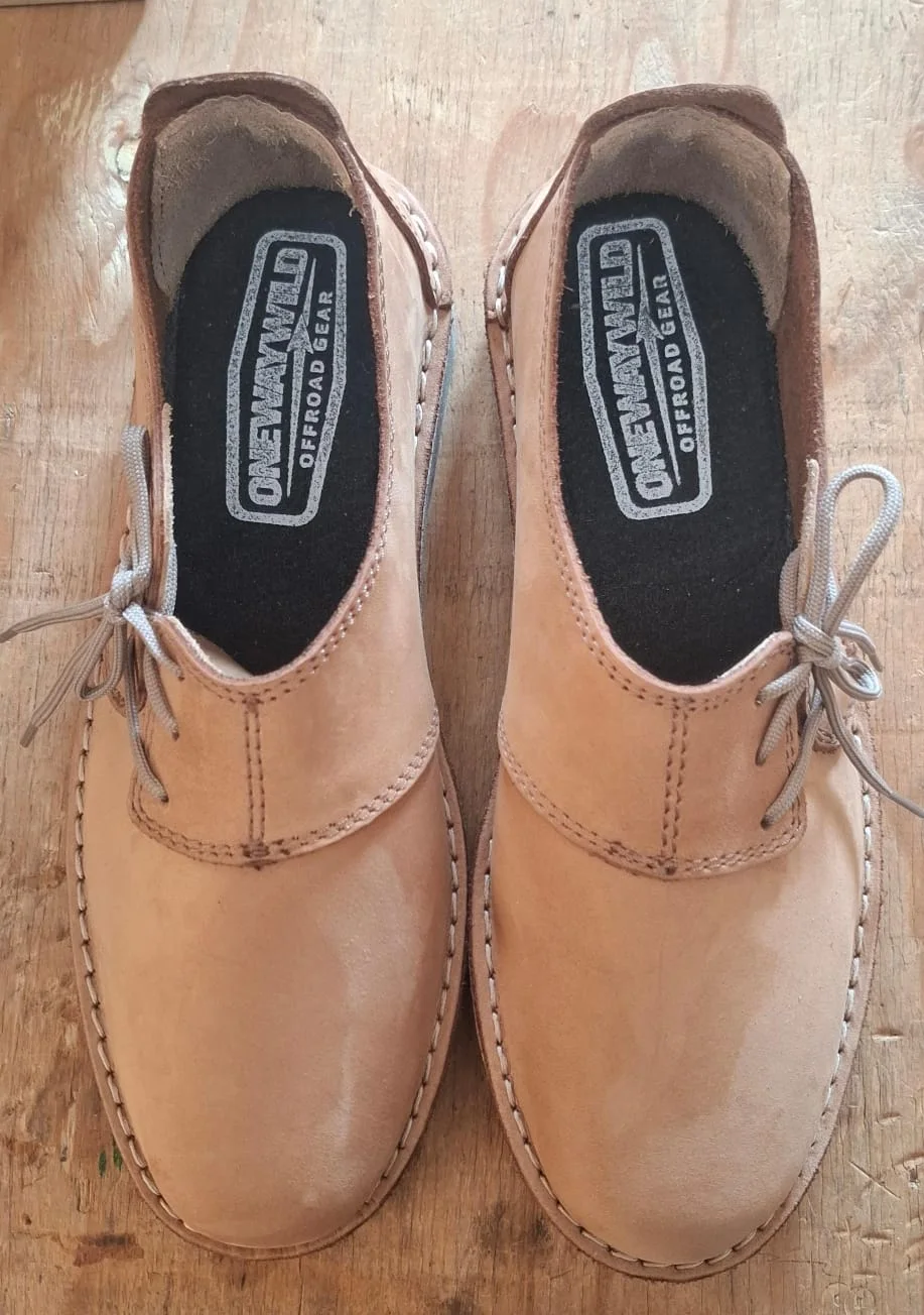 Close-up of the Onewaywild Trail Vellie showing the branded footbeds
